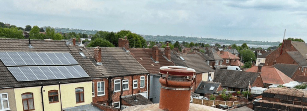 This is a photo taken from a roof which is being repaired by Keyworth Roofing Repairs, it shows a street of houses, and their roofs