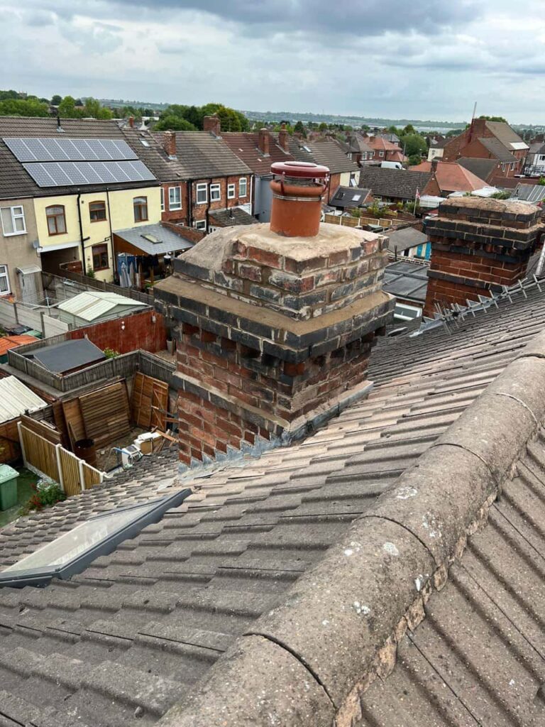 This is a photo taken from a roof which is being repaired by Keyworth Roofing Repairs, it shows a street of houses, and their roofs